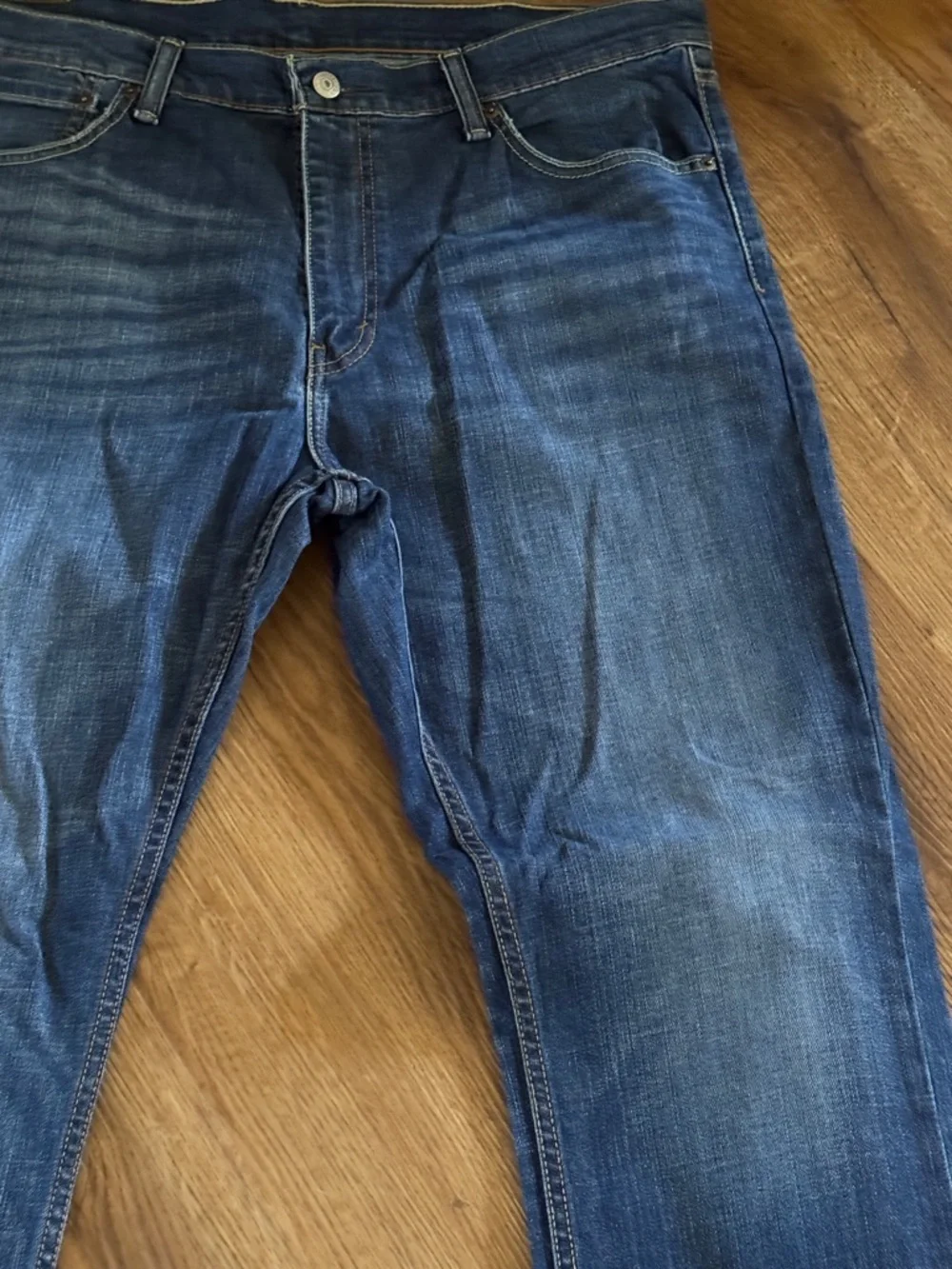 Levi's Blue Bootcut Jeans with Faded Whiskering 527